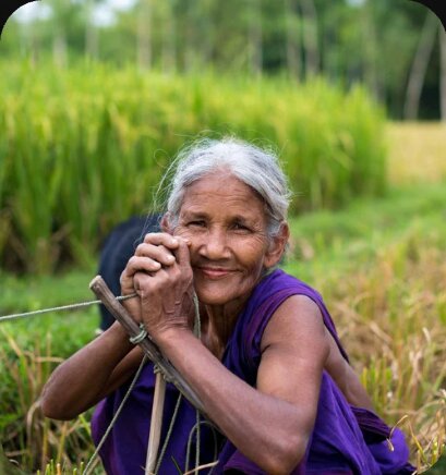 Woman smiling in a village